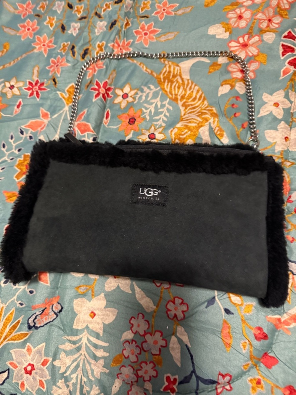 UGG Black Faux Shearling is a muffler to put your hands in the sides for warmth